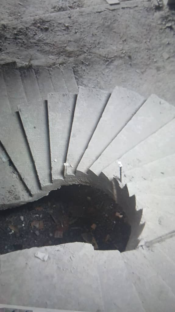 Aerial view of a concrete spiral staircase under construction